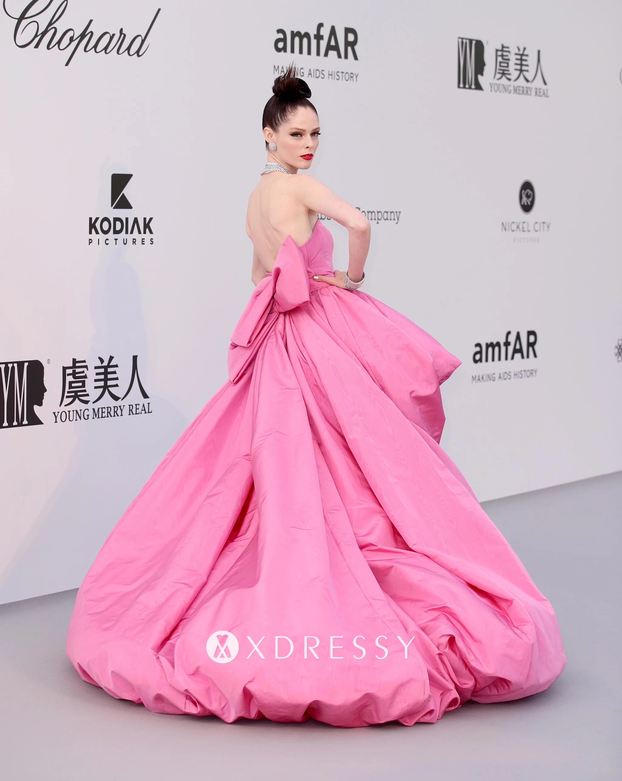 Coco Rocha pink dress with large bow Coco Rocha pink dress with large bow