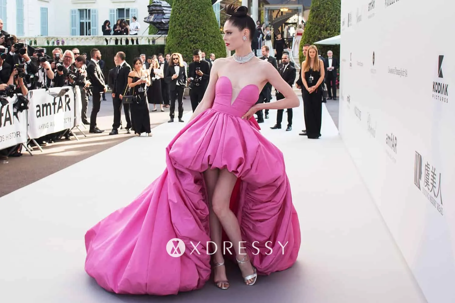 Coco Rocha pink strapless short front long back dress Coco Rocha pink strapless short front long back dress