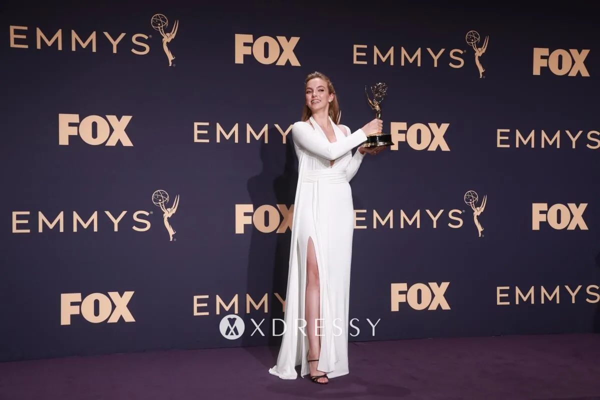 Jodie Comer white spandex long sleeve formal gown at 2019 Emmys Jodie Comer white spandex long sleeve formal gown at 2019 Emmys