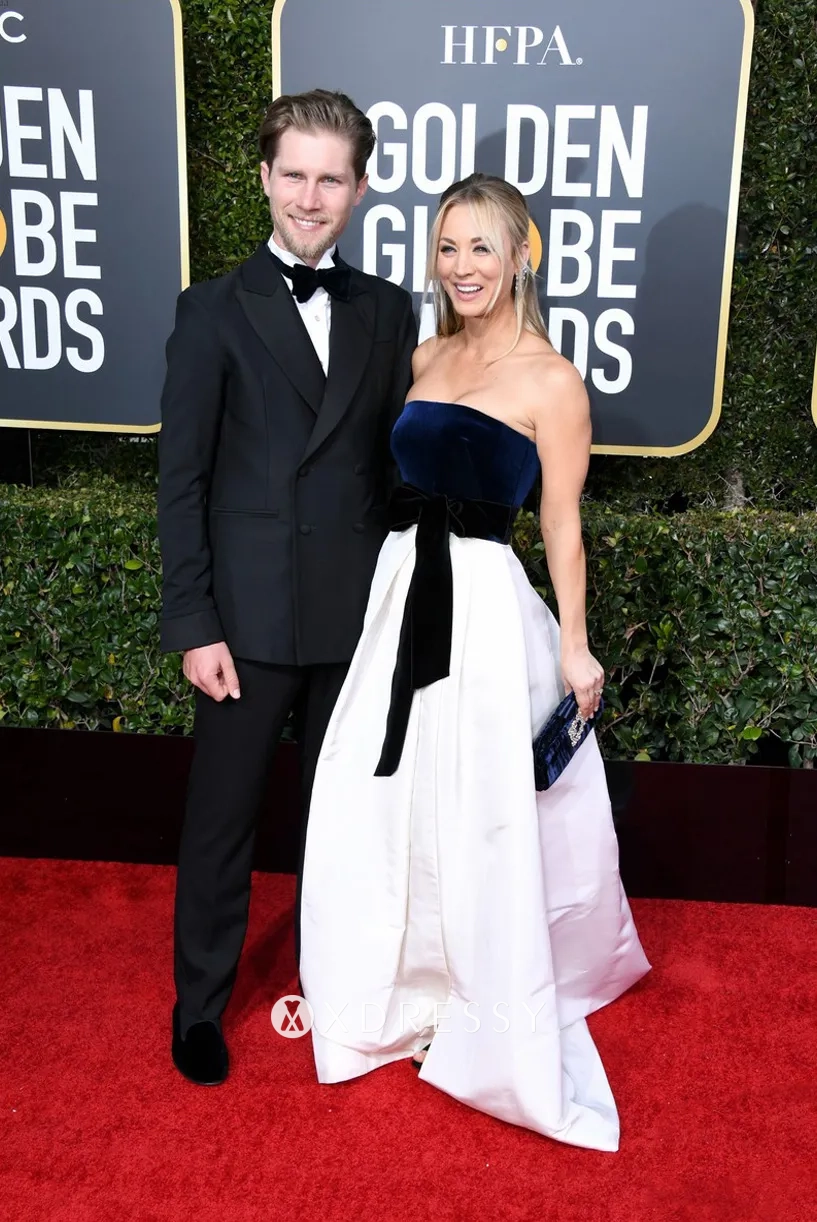 Kaley Cuoco navy and white dress with black bow