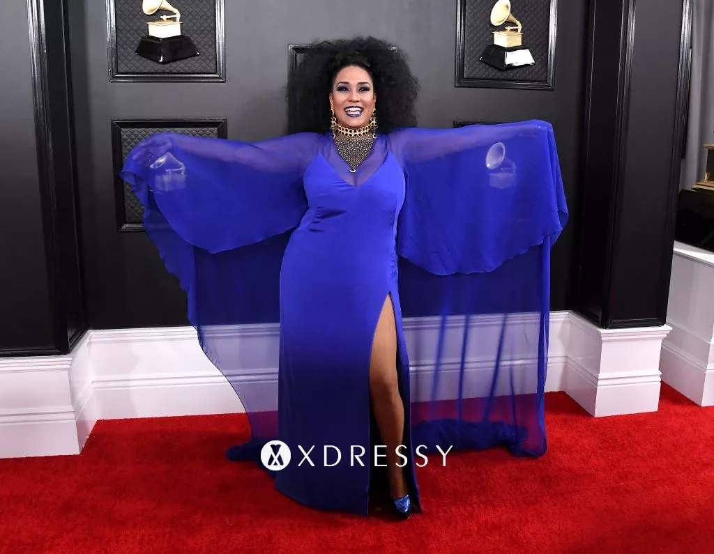 Aymee Nuviola royal blue slit caped dress at the 2020 Grammys