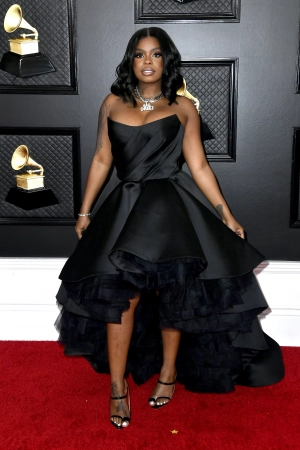 Dreezy Black satin strapless high low ball gown at 2020 Grammys
