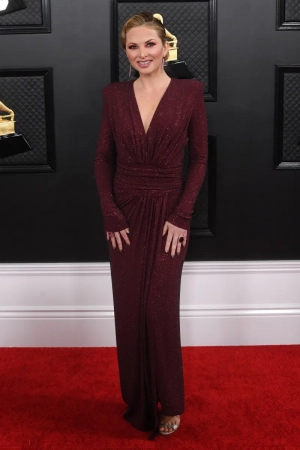 Lauren Zima burgundy sequin slit formal gown at the 2020 Grammys