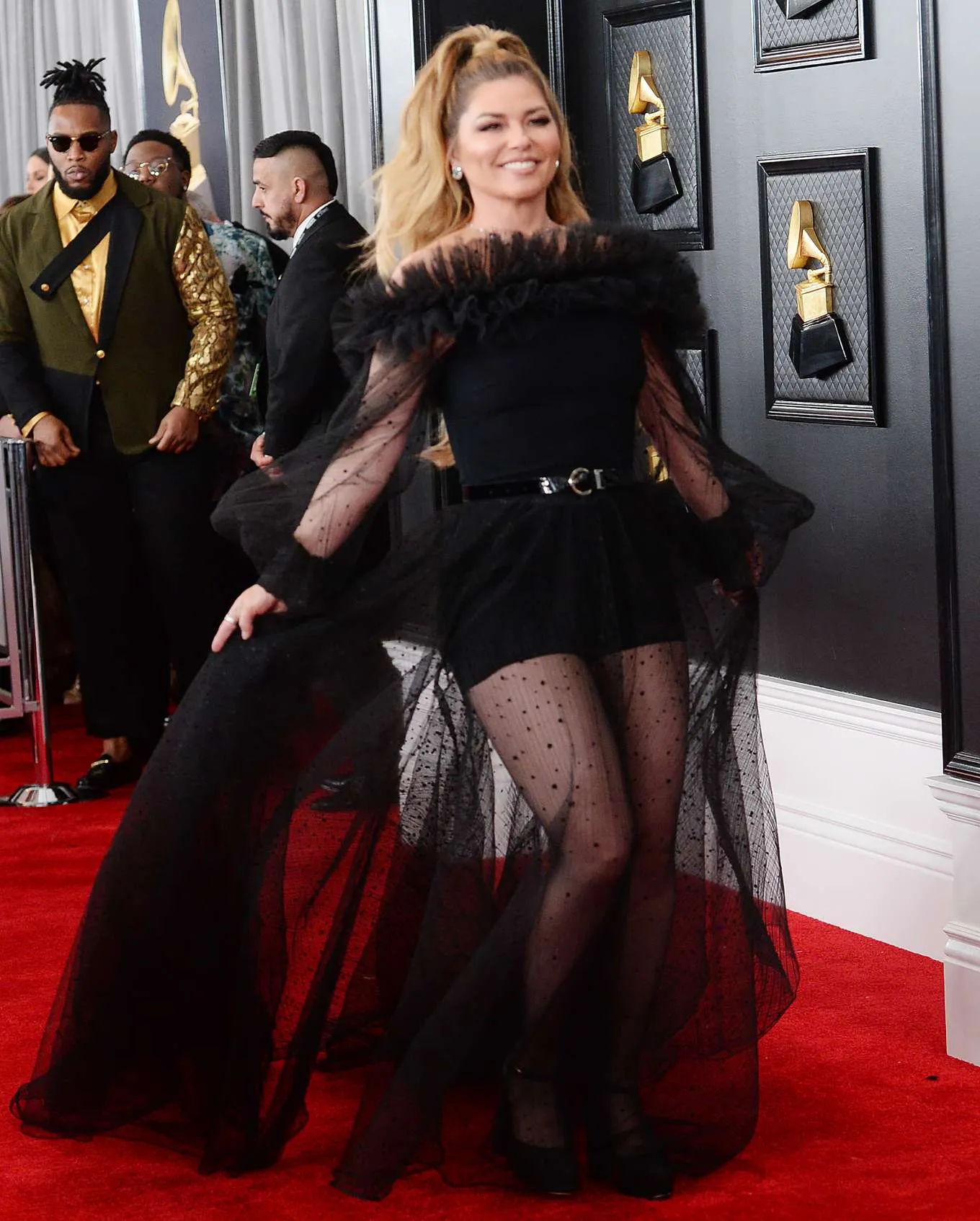 Shania Twai black dotted tulle ruffled off shoulder sheer celebrity gown