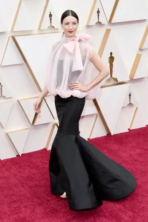 Caitriona Balfe black mermaid dress with pink blouse on the red carpet