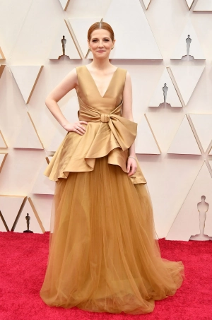 Krysty Wilson cairns gold bow peplum dress 2020 Oscars