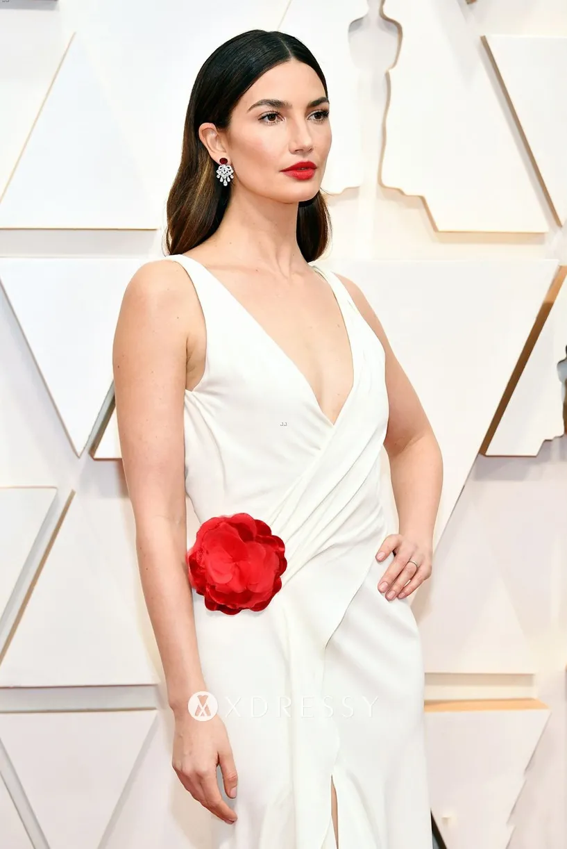 Lily Aldridge white pluning V neck evening dress with red flower Lily Aldridge white pluning V neck evening dress with red flower