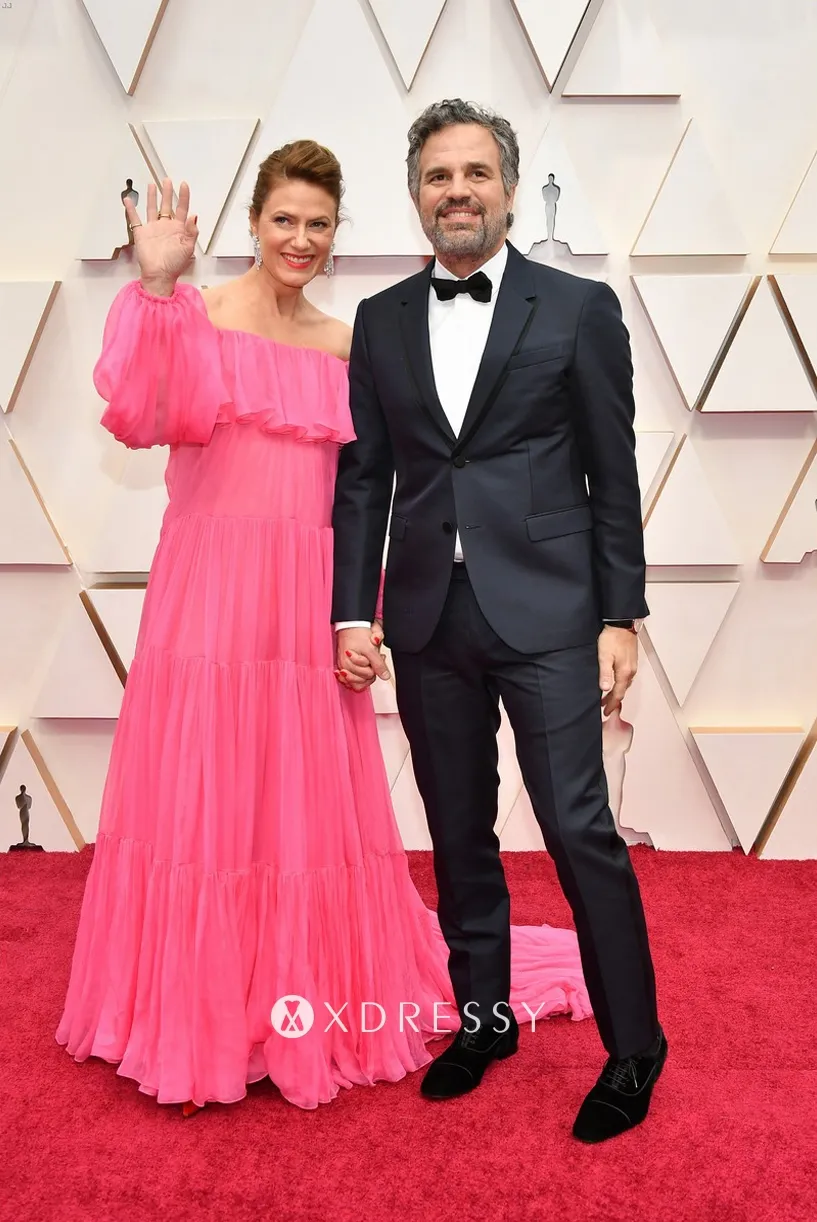 Sunrise Coigney hot pink off shoulder dress with Mark Ruffalo Sunrise Coigney hot pink off shoulder dress with Mark Ruffalo