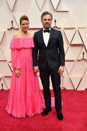 Sunrise Coigney hot pink off shoulder ruffled dress at the 2020 Oscars