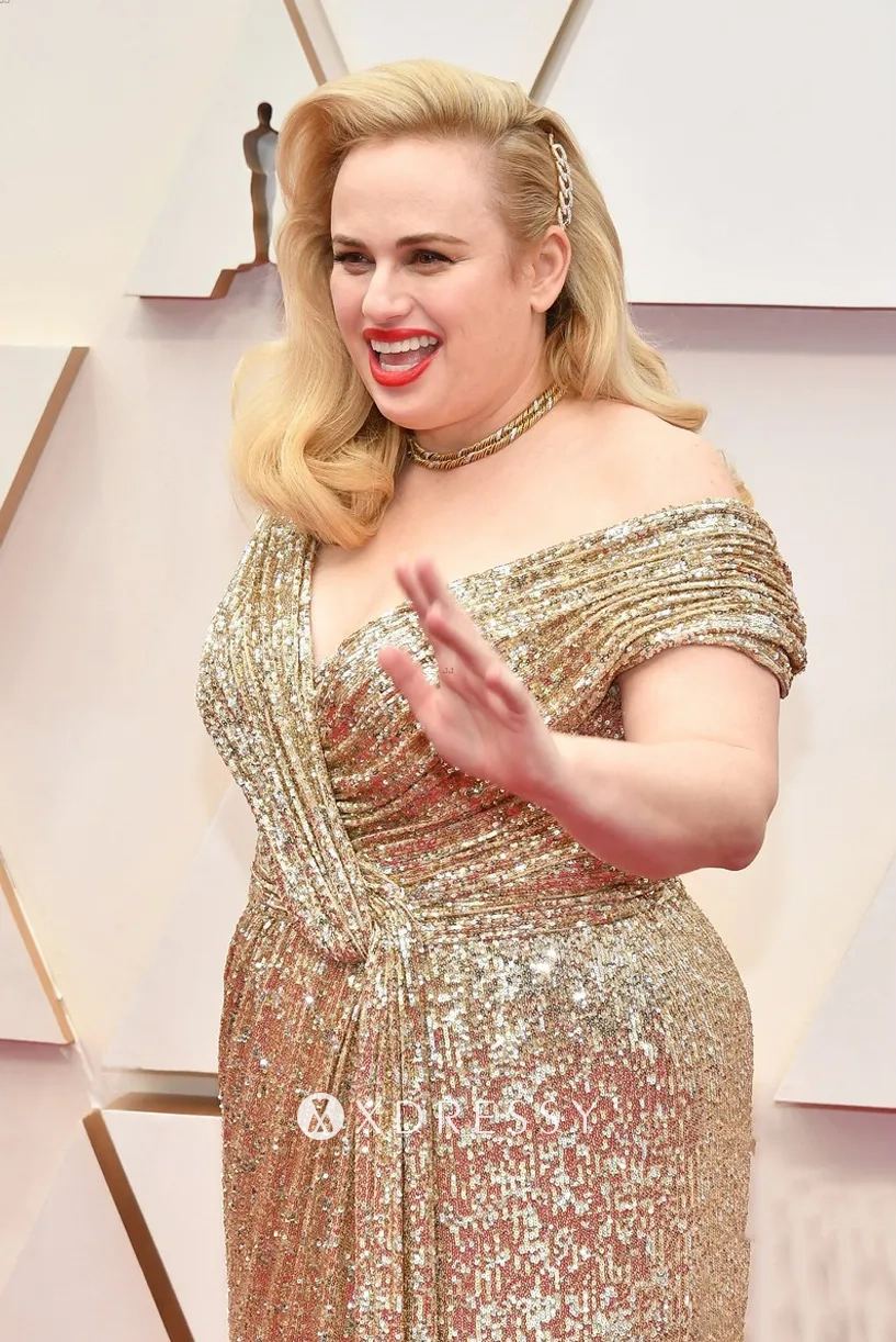 Rebel Wilson gold sequin off shoulder evening dress Rebel Wilson gold sequin off shoulder evening dress