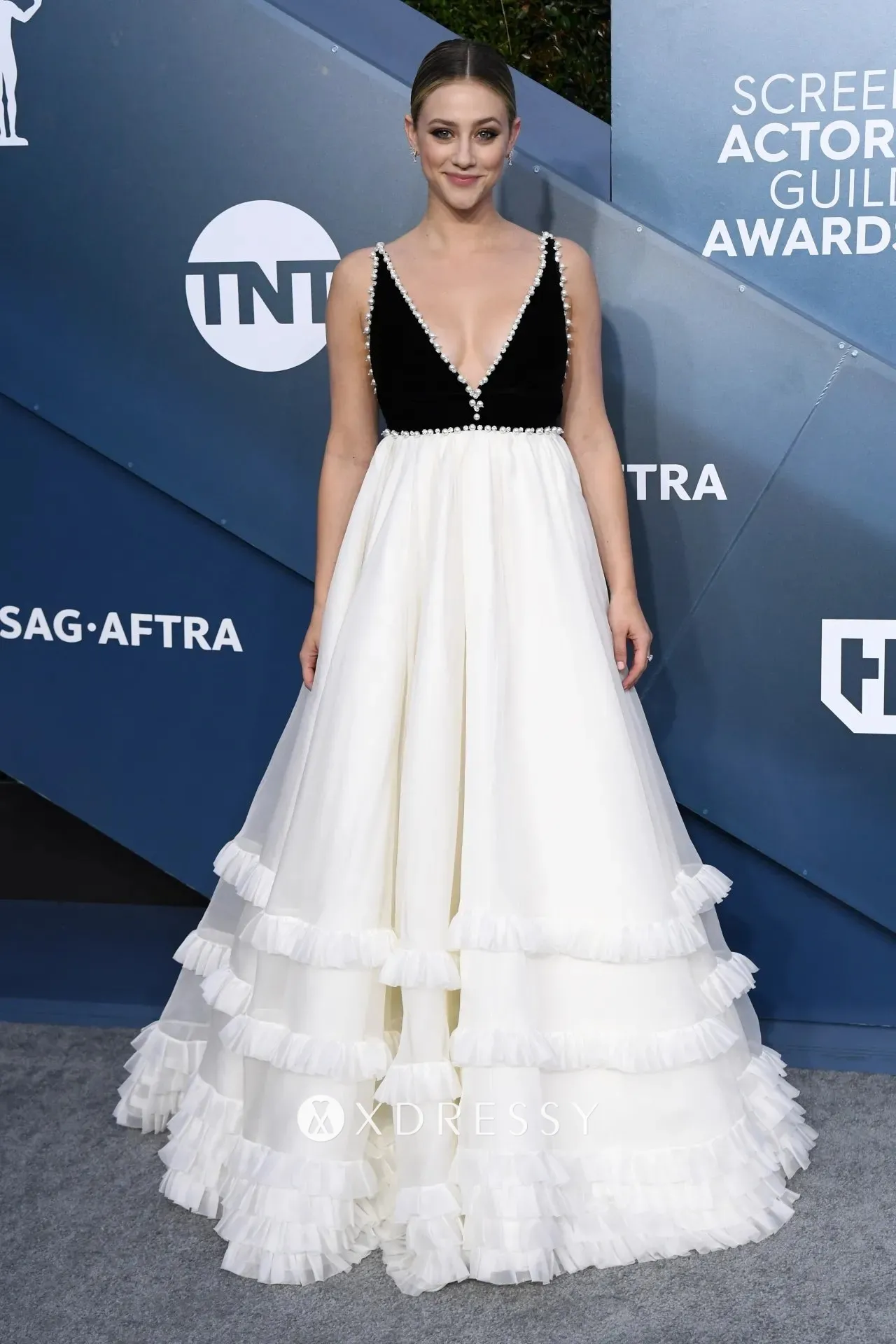 Lili Reinhart plunging neck pearled black white evening dress Lili Reinhart plunging neck pearled black white evening dress