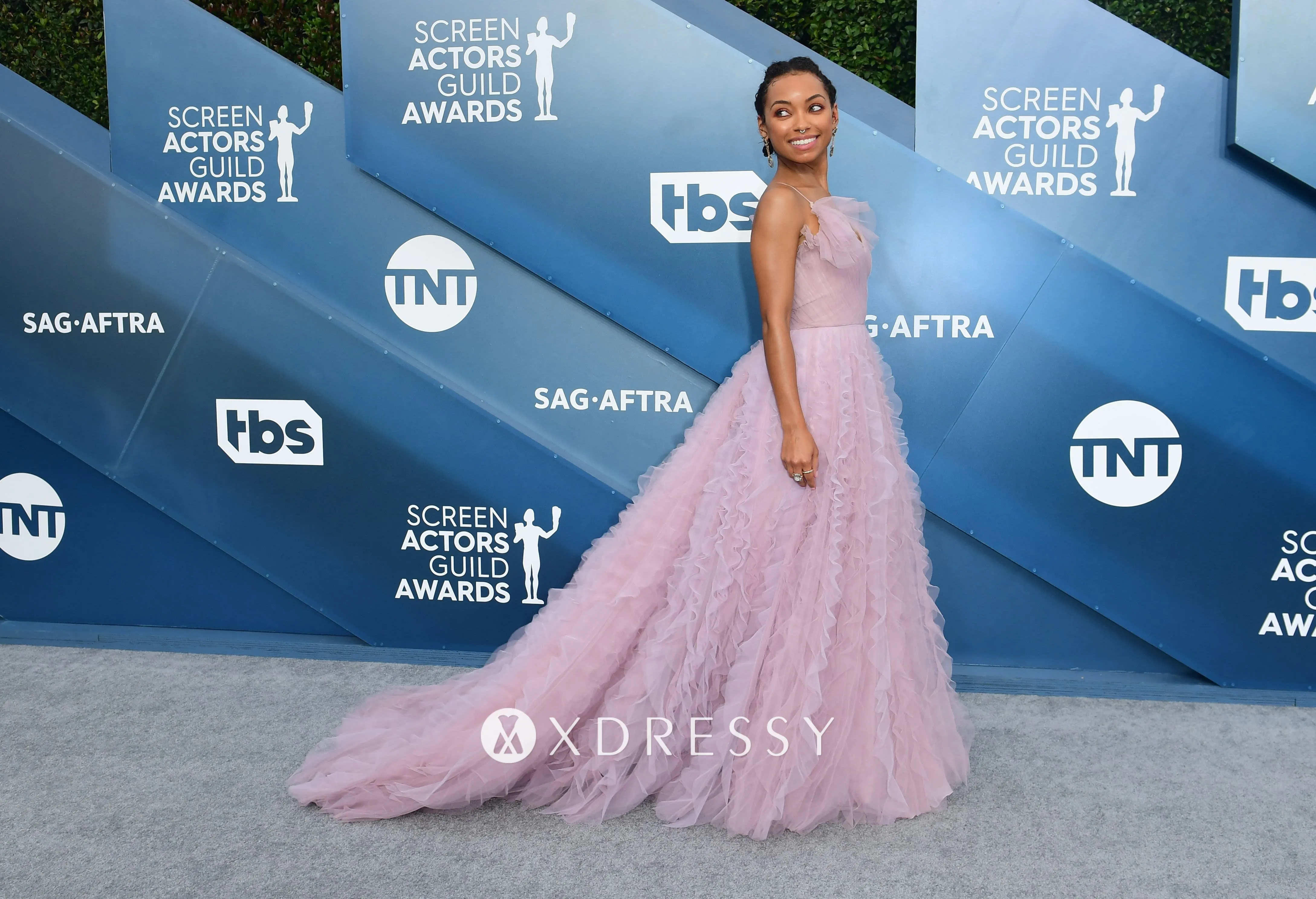 Logan Browning pink tulle ruffled ball gown on the 2020 SAG red carpet Logan Browning pink tulle ruffled ball gown on the 2020 SAG red carpet
