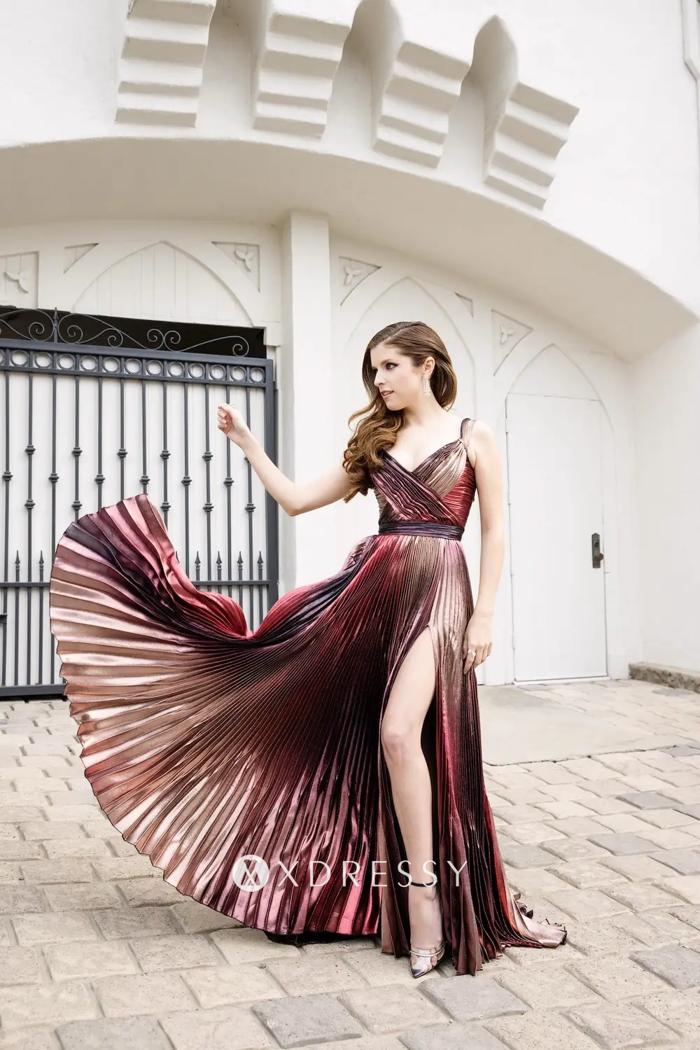Anna Kendrick pleated shimmering red carpet dress