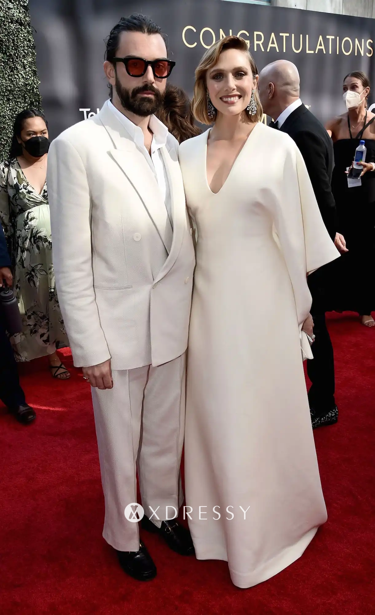 Elizabeth Olsen cream gown on the 2021 Emmys red carpet