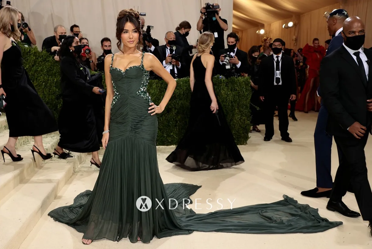Madison Beer dark green chiffon evening dress with long train