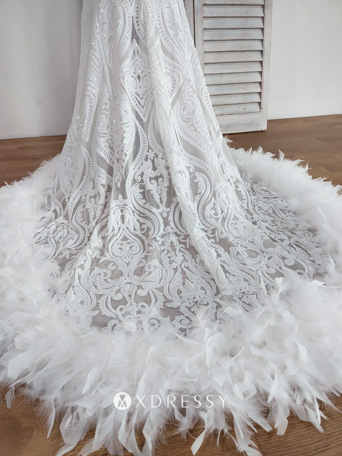 white mermaid sequin medium train with fetahered hemline