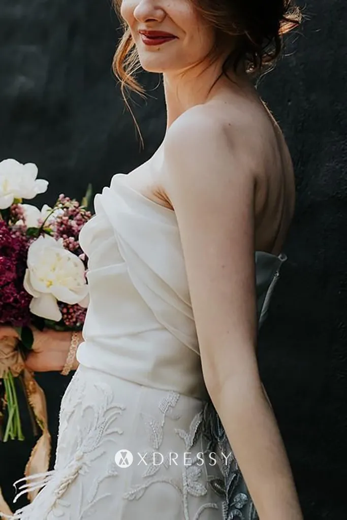 Draped ivory satin faced organza bridal dress Draped ivory satin faced organza bridal dress