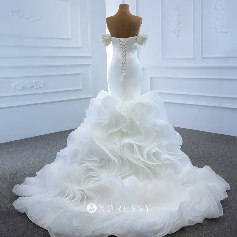 ruffled ivory organza wedding dress with court train