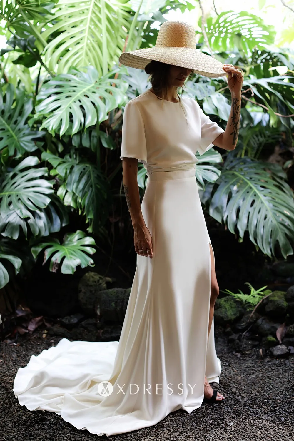 ivory satin short sleeve keyhole back modern bridal gown