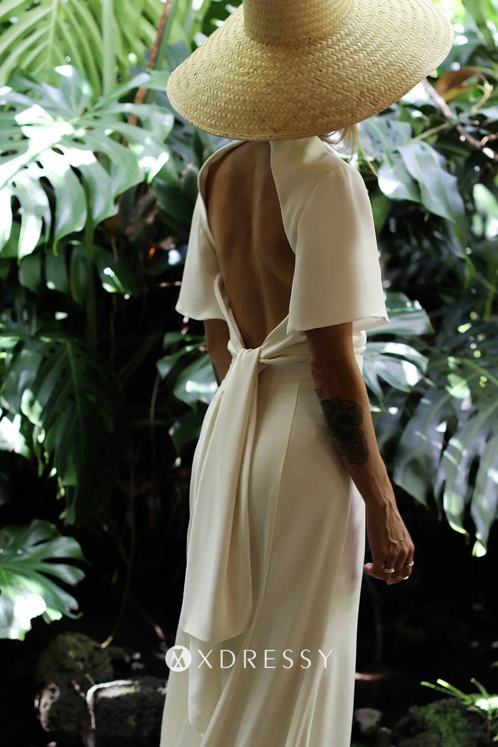 ivory satin short sleeve open back bridal gown