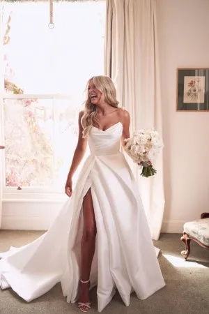 simple v neck ivory satin bridal dress with leg slit