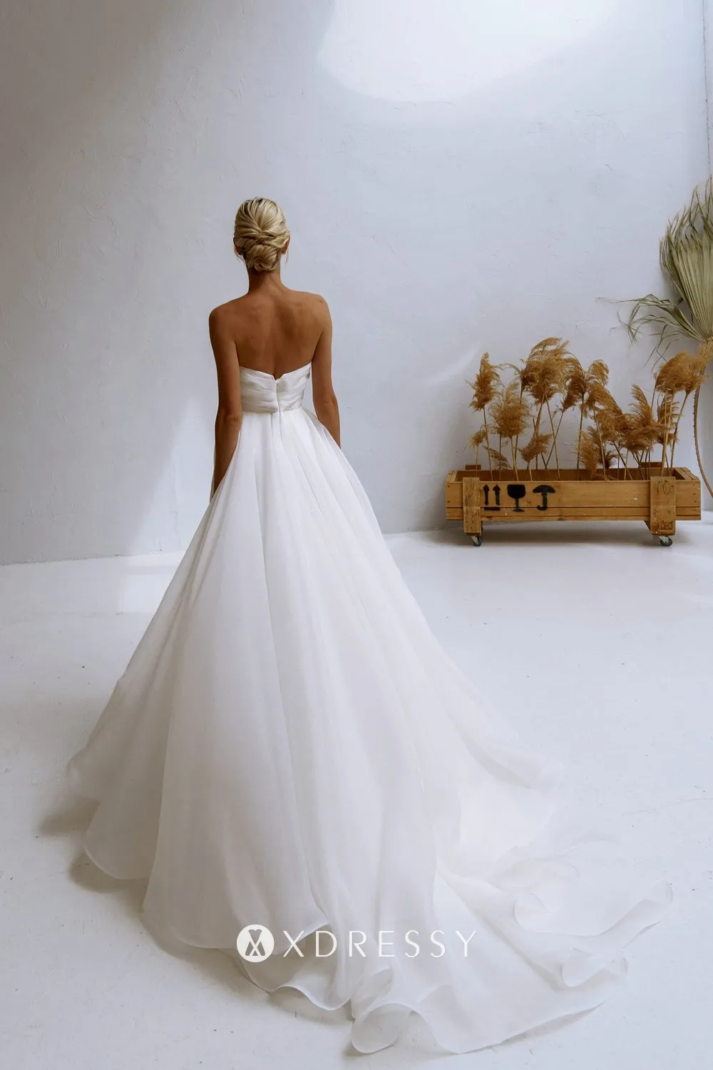 pleated ivory organza low back bridal gown