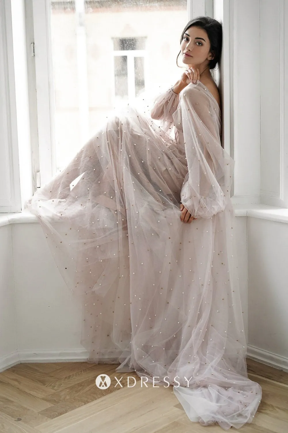 pearled blush pink long sleeve spring wedding gown