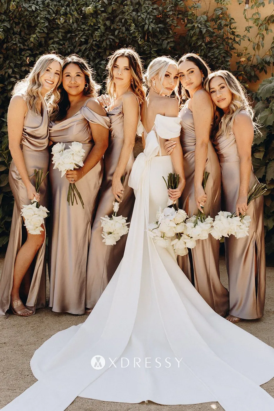 off the shoulder ivory satin mermaid bridal gown with a chapel train