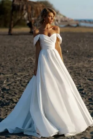 simple satin off the shoulder destination wedding gown