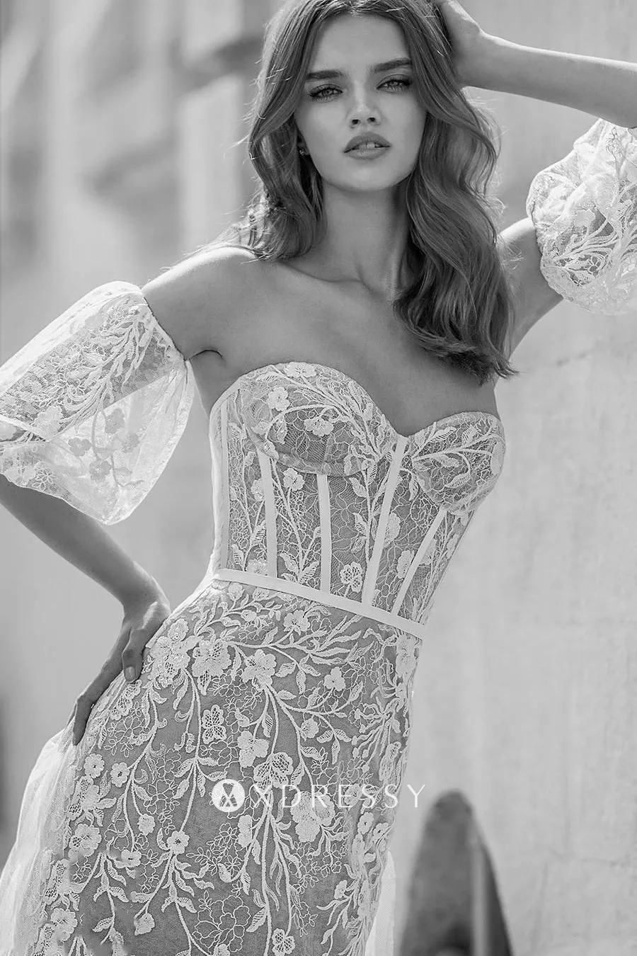 corset bodice illusion wedding gown with puff sleeves