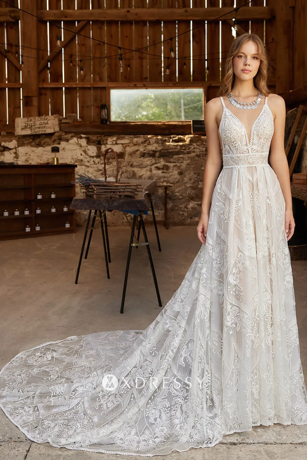 spaghetti straps plunge neck lace wedding gown with chapel train