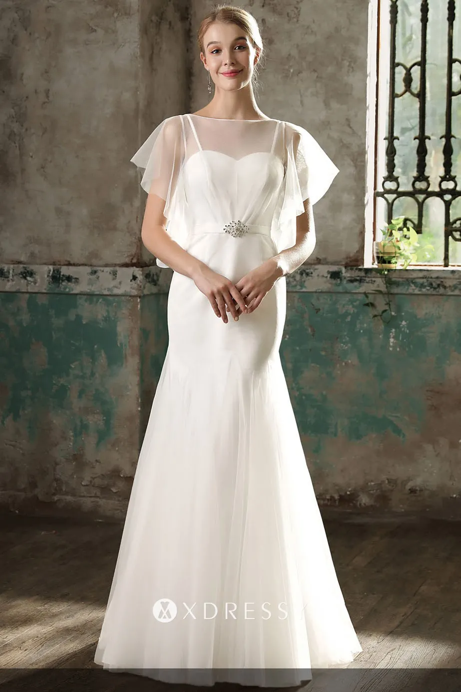 Ivory chiffon and tulle mermaid sheer wedding gown Ivory chiffon and tulle mermaid sheer wedding gown