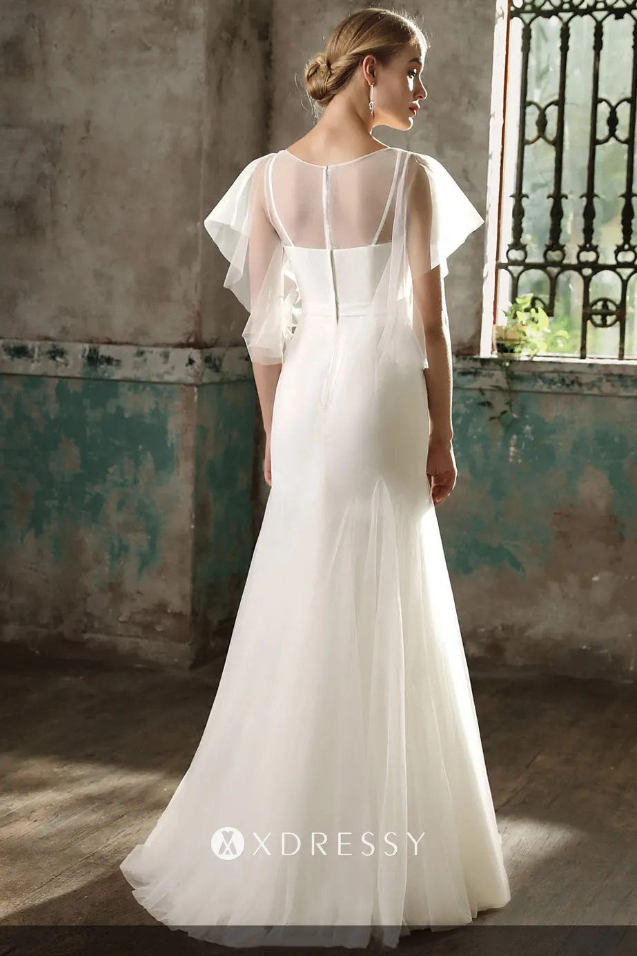 Ivory chiffon and tulle sheer wedding gown Ivory chiffon and tulle sheer wedding gown