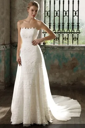 Stunning ivory lace fit and flare wedding dress with tulle train