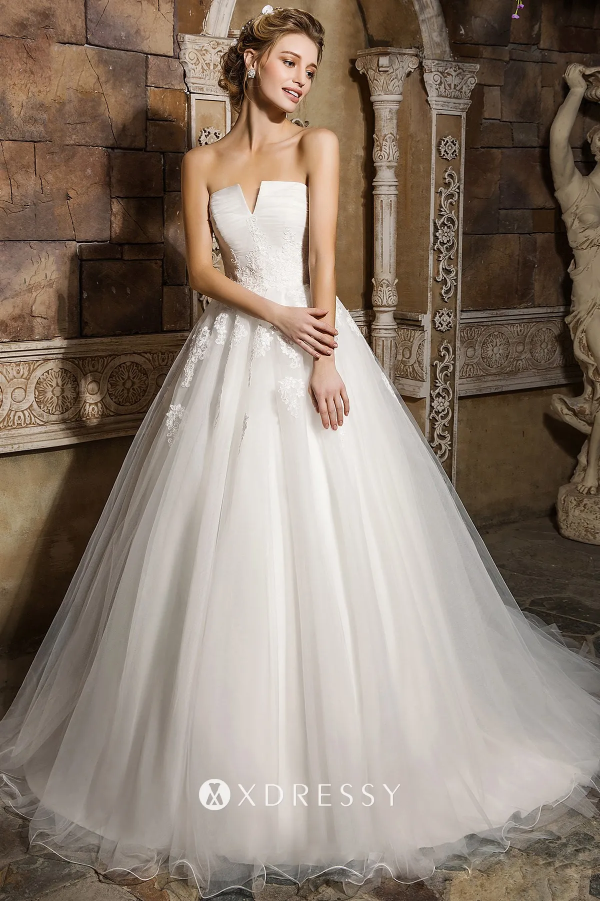 white lace appliqued tulle pleated bridal ballgown