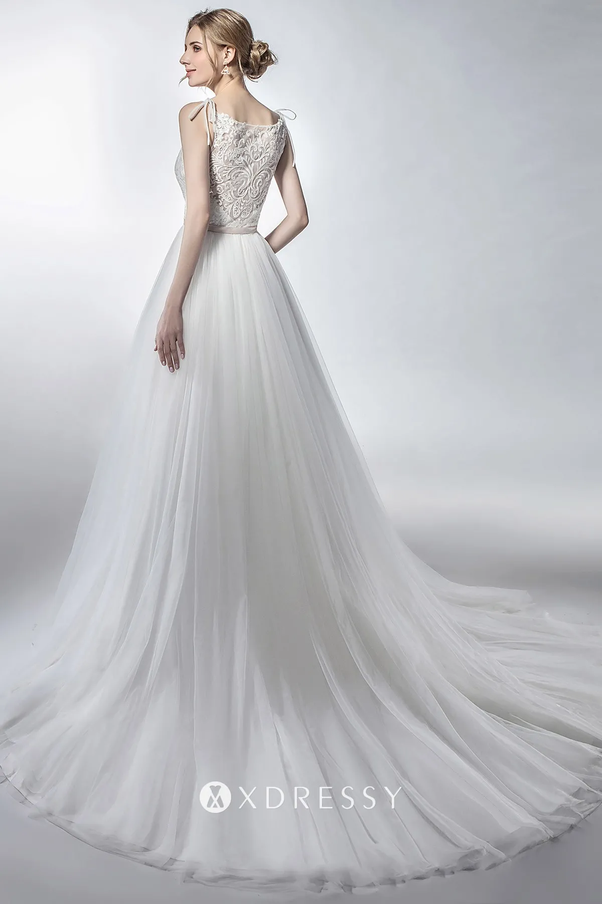 illusion back ivory lace A line bridal gown with tulle overskirt illusion back ivory lace A line bridal gown with tulle overskirt