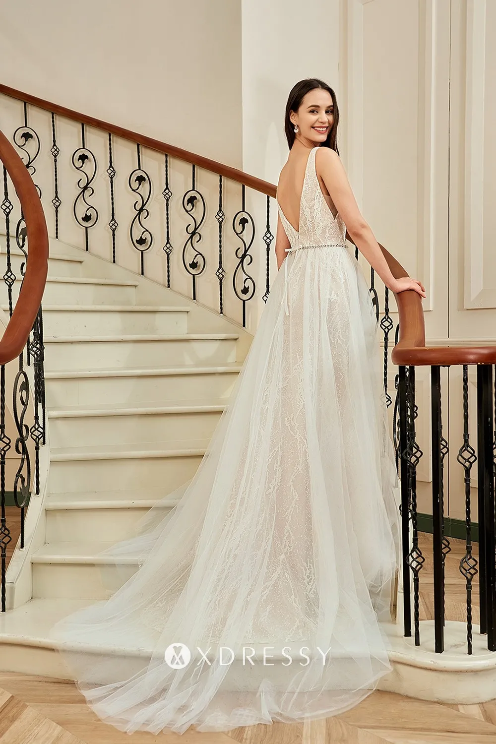 plunging low V back wedding dress with detachable tulle overskirt plunging low V back wedding dress with detachable tulle overskirt
