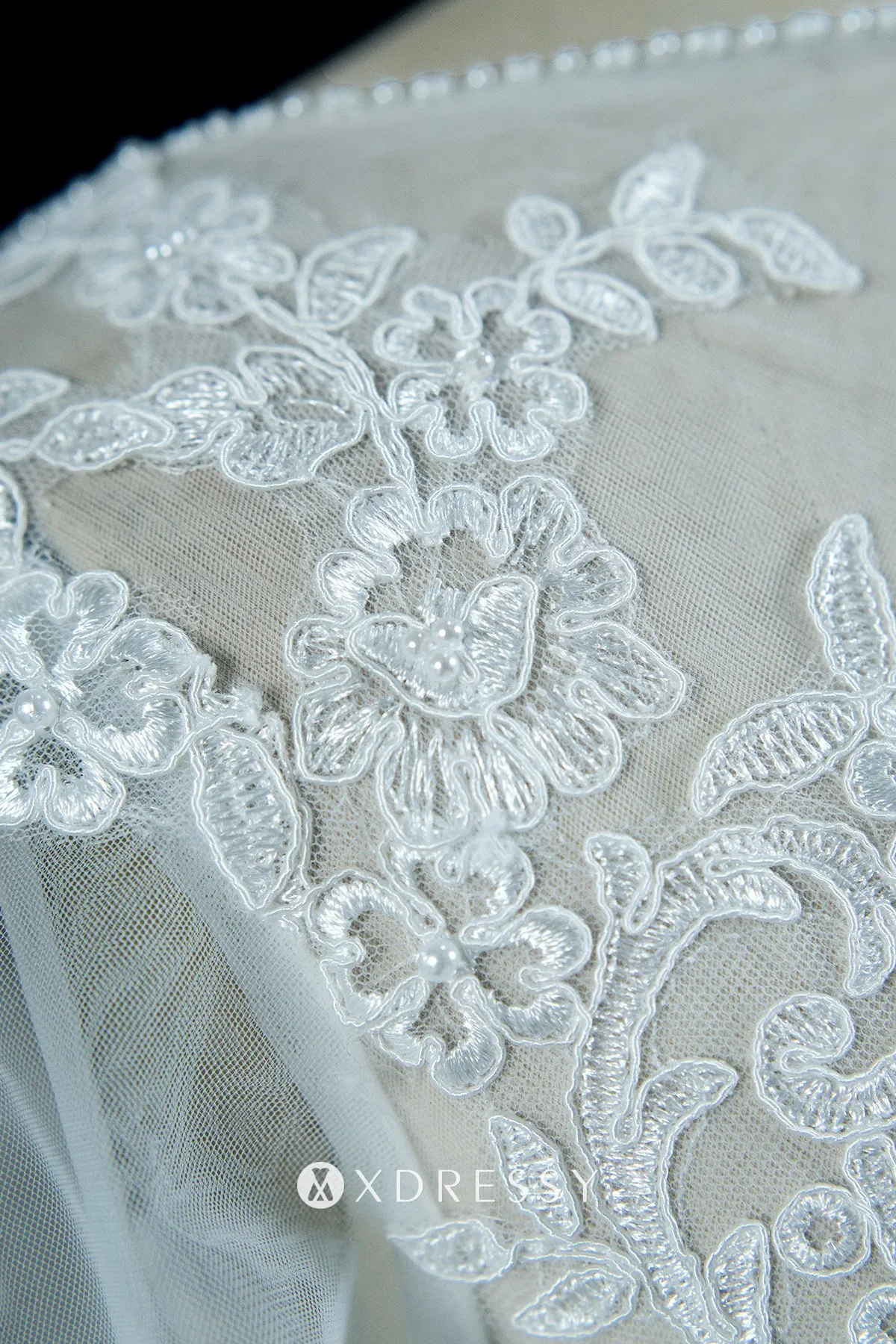 beaded lace illusion long sleeve plunging neck wedding dress